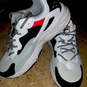 Men’s Fila sneakers 9 1/2. New. Never worn.